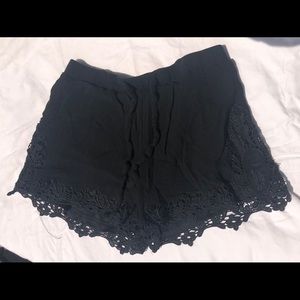 Black shorts with lace detailing